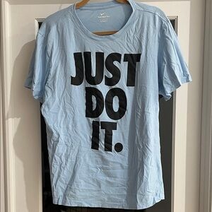 Nike Men's Light Blue Tee with Black Text